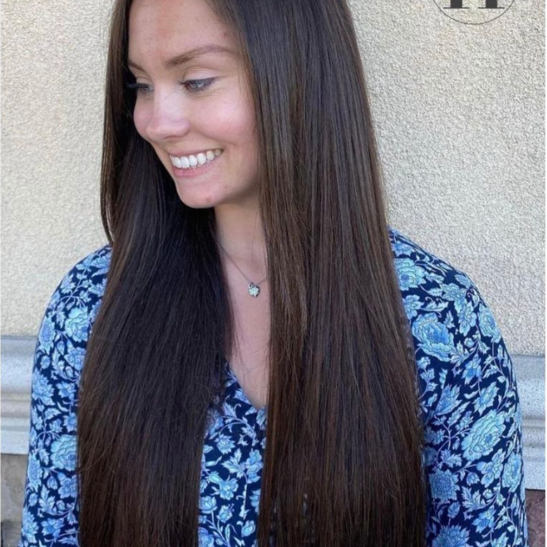 Image of a woman with brown straight hair