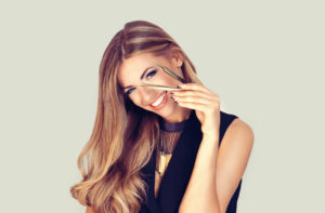 woman enjoying weft hair extensions